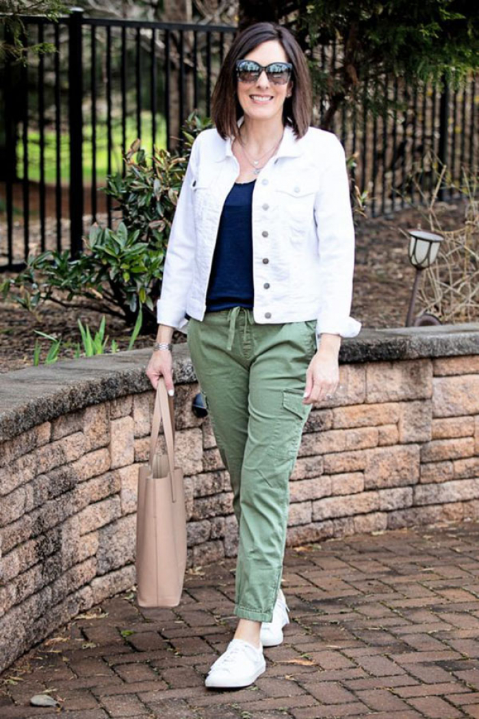 White jacket with green jeans